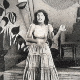 a black and white drawing of a woman in a white dress