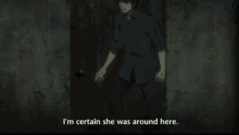a person in a dark room with their hands out