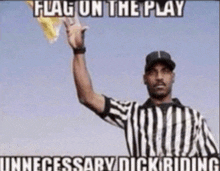 a referee holds up a flag with the words flag on the play unnecessary dick riding below him