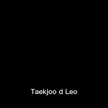 a close up of a man in a suit and tie with the words taekjoo d leo written on it .
