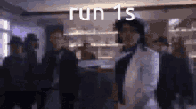 a blurry picture of a person with the words run 1s written on it