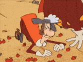 a cartoon character is crawling on the ground surrounded by strawberries