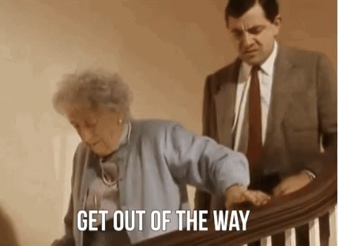 Mr Bean Get Out Of The Way GIF - Mr Bean Get Out Of The Way Try To Get Past GIFs