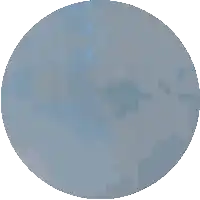 a blurred image of a person 's face in a circle