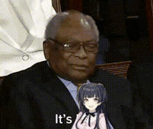 a man in a suit and tie is holding a doll that says it 's .