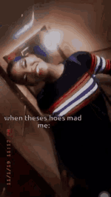 a woman is taking a selfie with the words when these hoes mad me