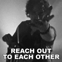 Reach Out To Each Other John Oates GIF - Reach Out To Each Other John Oates Pushin A Rock Song GIFs