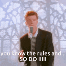 a man singing into a microphone with the words " you know the rules and so do "