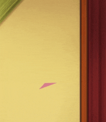 a yellow wall with a red curtain hanging on it