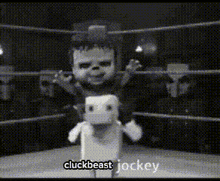 a black and white photo of a boxing ring with the words cluckbeast jockey in the corner