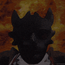 a picture of a man with a dragon mask and sunglasses