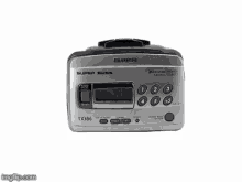 an aiwa super bass cassette player is shown on a white surface
