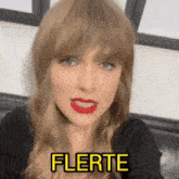 a close up of a woman 's face with the word fuerte written on it