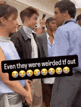 a group of people are standing next to each other with a caption that says even they were weirded tf out