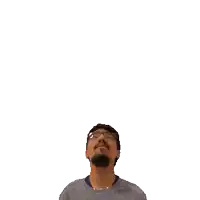 a man with glasses and a beard has a green cross above his head