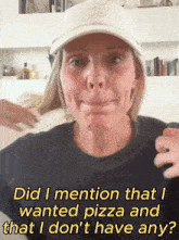 a woman wearing a hat and a t-shirt says did i mention that