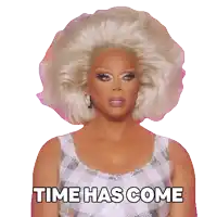 a woman in a wig says time has come in black letters