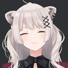 a close up of a girl with white hair and a black bow