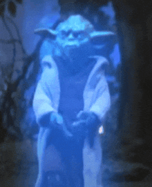 a glowing statue of yoda is standing in a dark room