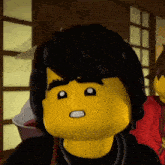 a close up of a lego character making a surprised face