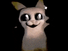 a person standing next to a stuffed cat with big blue eyes