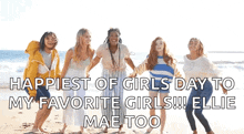 a group of girls are jumping in the air on a beach with the caption happiest of girls day to my favorite girls !!!