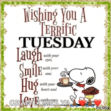 a picture of snoopy holding a cup of coffee and cookies