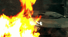a car is on fire with the letter l on the front