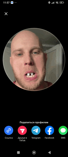a screenshot of a man 's face on a phone with a circle around it