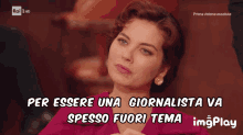 a screen shot of a woman with the words " per essere una giornalista va spesso fuori tema "