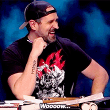 a man with a tattoo on his arm that says mirror on it