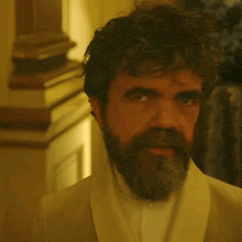 a man with a beard and a white shirt says you 're not going anywhere