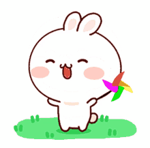 bunny rabbit play pinwheel adorable