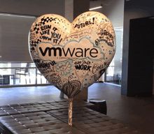 a heart shaped balloon with the word vmware written on it