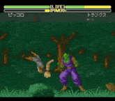 a video game screen shows piccolo and trunks fighting in a forest