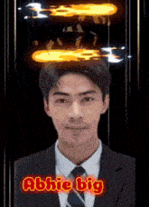 a man in a suit and tie with the name abbie big on the bottom