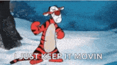 tigger from winnie the pooh is dancing in the snow and saying `` i just keep it movin ''