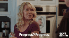 a woman says " progress progress " in a super channel ad