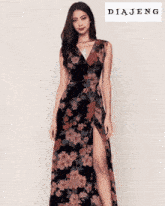 a woman in a floral dress is standing on a red carpet with the word diajeng behind her