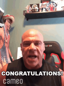 a bald man says congratulations cameo in a video