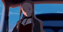 a woman with long brown hair is wearing a choker