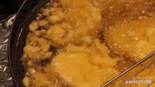 a close up of a pan of food with the words made in animotica visible