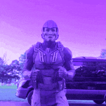 a man in a purple suit is standing in front of a purple van