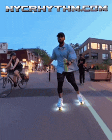 a man is rollerblading down a street with nycrhythm.com written above him