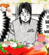 a man wearing a life sweatshirt is surrounded by strawberries