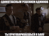a man in a blue shirt has a foreign language caption above him