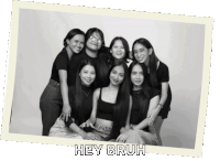 a group of women are posing for a picture and the caption says hey bruh