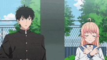a boy and a girl standing next to each other