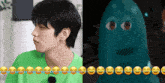 a man in a green shirt is next to a cartoon character