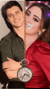 a man and a woman are standing next to each other with a pocket watch hanging from their neck